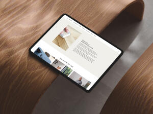 mockuuups ipad pro landscape mockup on curved wooden surface