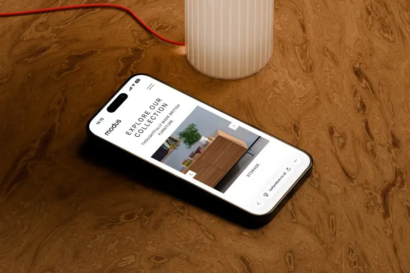 mockuuups iphone 16 mockup with wooden texture