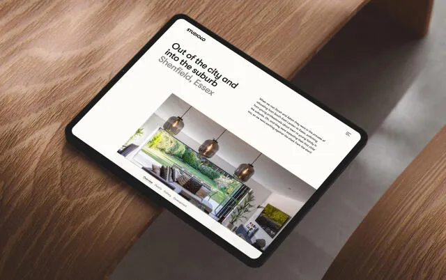 mockuuups ipad pro landscape mockup on curved wooden surface