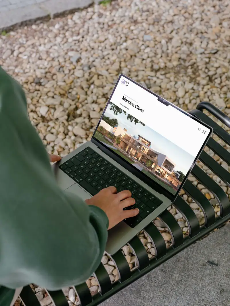 mockuuups person working on macbook pro mockup
