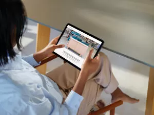 mockuuups ipad air mockup in female hand at modern home