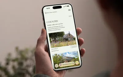 mockuuups iphone 15 pro mockup in male hand against neutral background