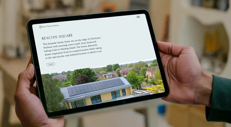 mockuuups person holding a tablet mockup