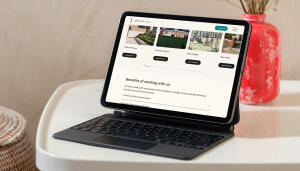 mockuuups ipad air mockup on a cozy home table with a decorative vase