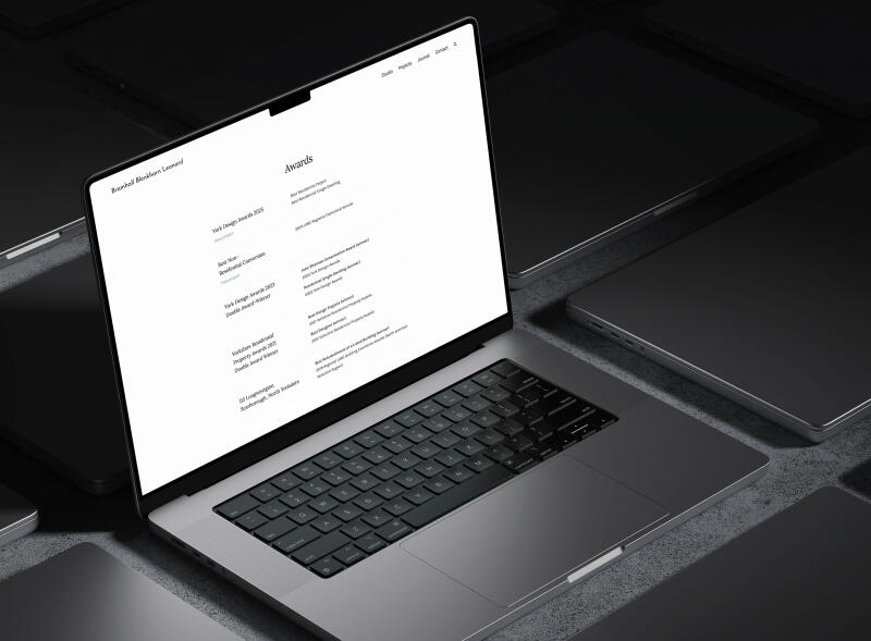 mockuuups macbook pro 16 inch mockup on a modern black desk