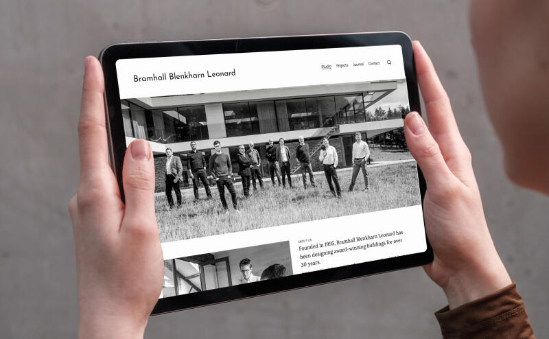 mockuuups woman holding ipad air in landscape view