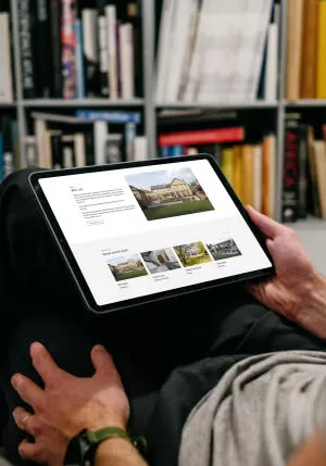 mockuuups ipad air mockup on a users lap