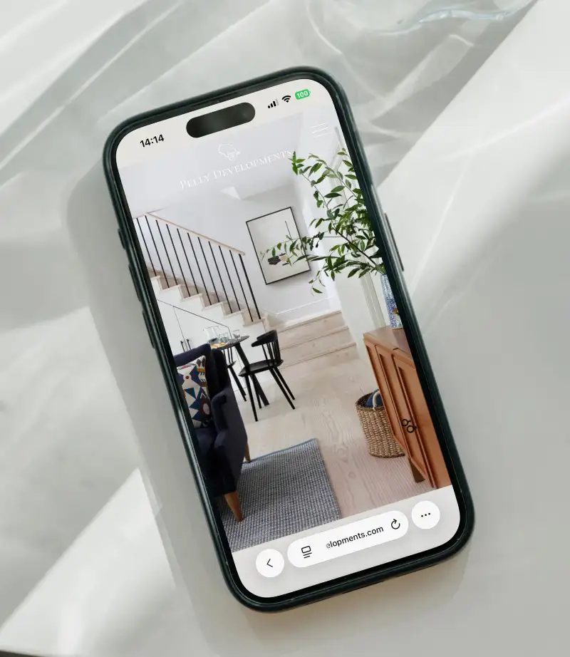 mockuuups iphone 15 pro mockup on a white modern table