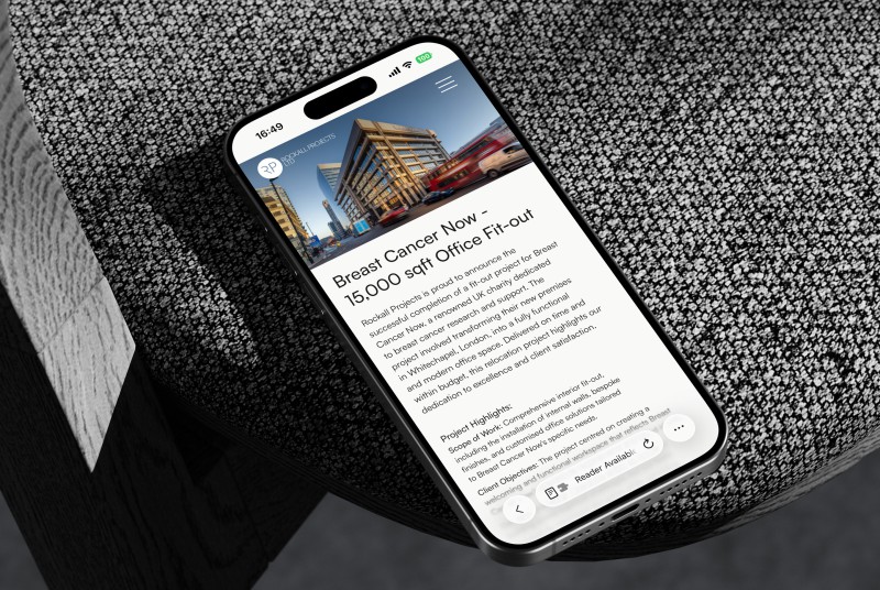 mockuuups iphone 15 pro mockup on textured rock surface with dramatic lighting