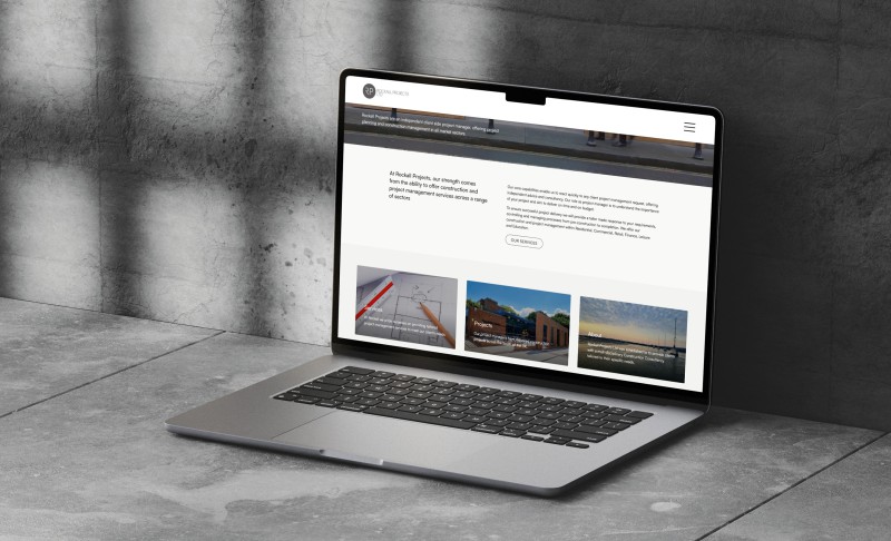 mockuuups macbook air mockup on a concrete surface
