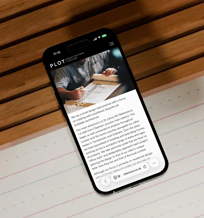 mockuuups iphone 16 mockup on a wooden desk