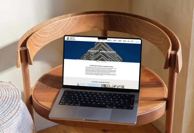 mockuuups macbook pro mockup on a round wooden table 1