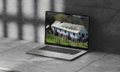 mockuuups macbook air mockup on a concrete surface