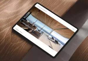 mockuuups ipad pro landscape mockup on curved wooden surface