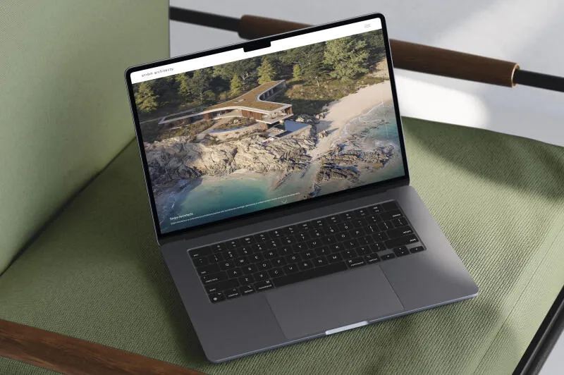mockuuups macbook air mockup on a green armchair