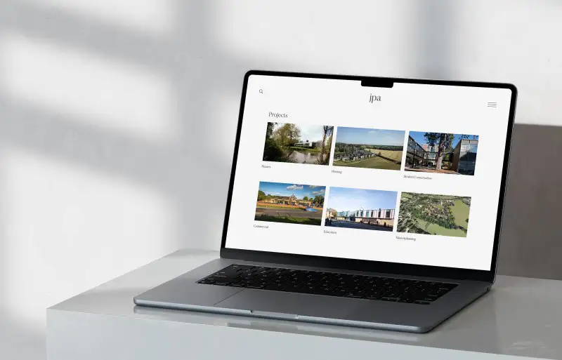 mockuuups macbook pro 14 inch mockup on marble surface with natural shadows