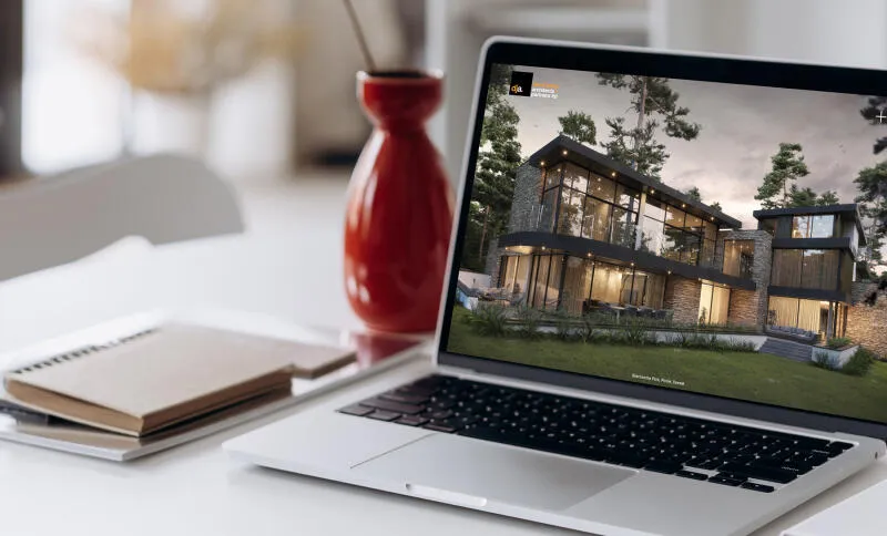 mockuuups macbook pro mockup beside a tall red vase