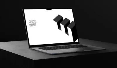 mockuuups macbook air mockup on a textured dark surface