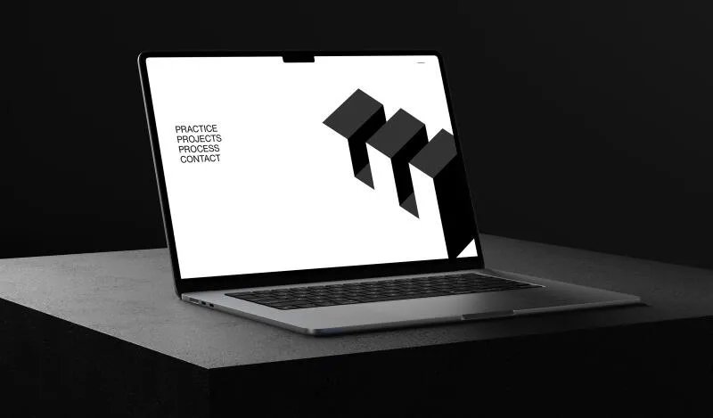 mockuuups macbook air mockup on a textured dark surface