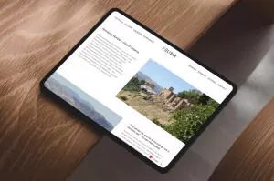 mockuuups ipad pro landscape mockup on curved wooden surface
