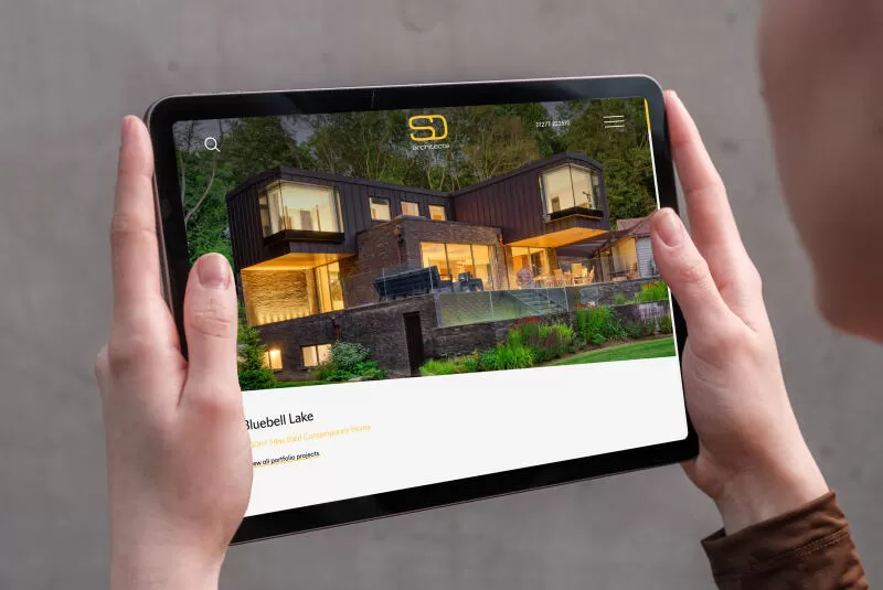 mockuuups woman holding ipad air in landscape view