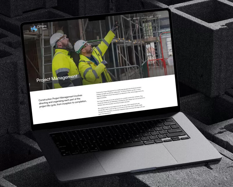 mockuuups sleek macbook pro displayed on industrial concrete blocks