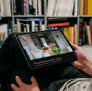 mockuuups ipad air mockup on a users lap