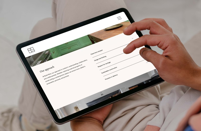 mockuuups male hands working on ipad air mockup