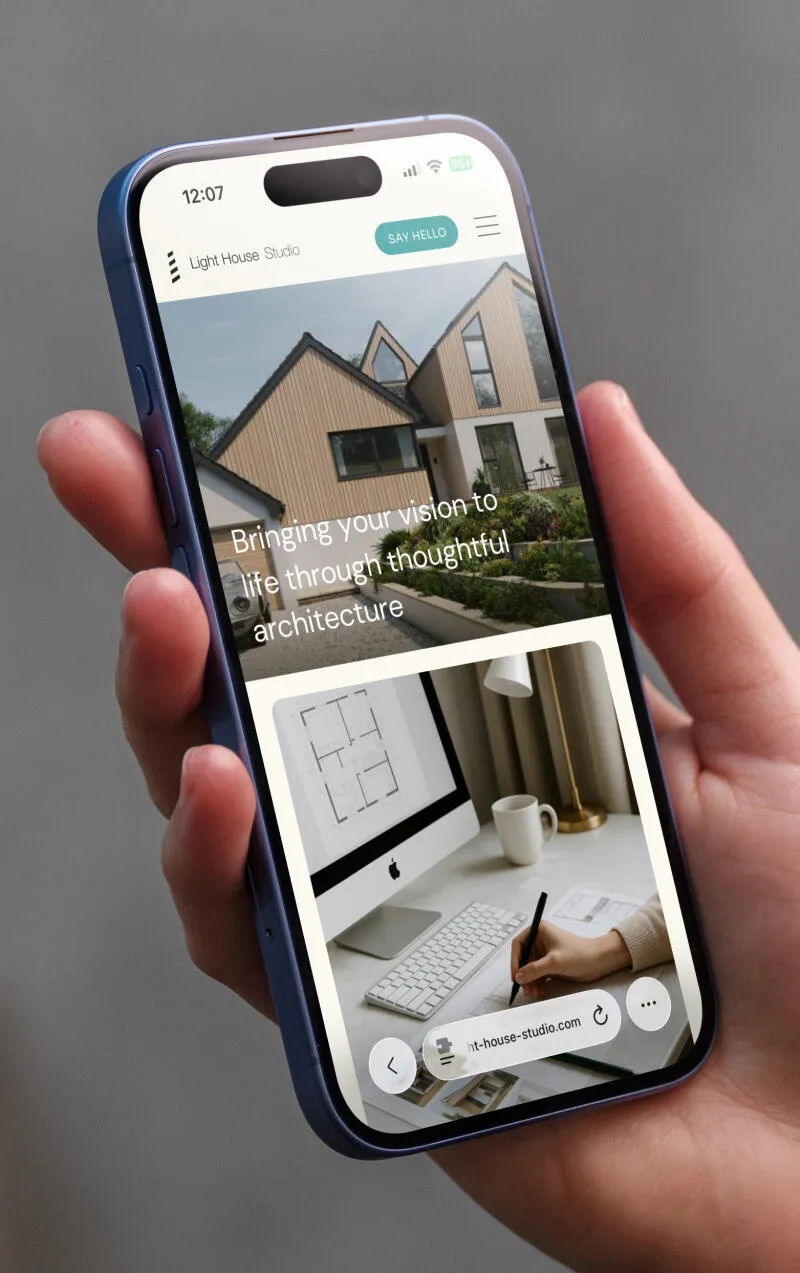 mockuuups iphone 16 mockup in a womans hand with concrete backdrop